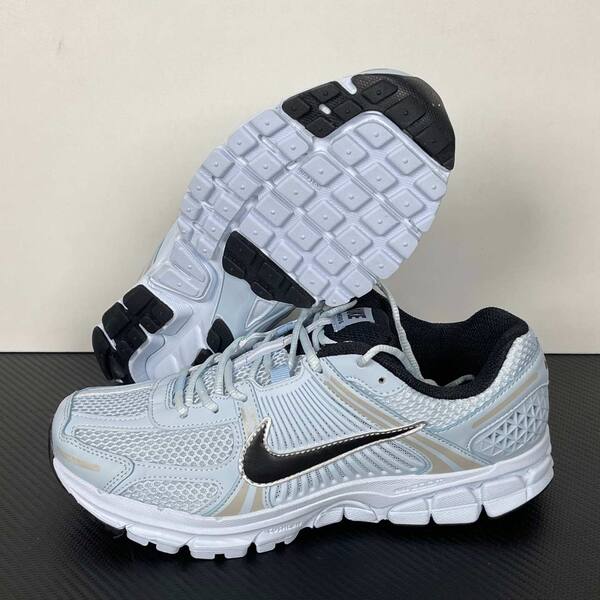 Nike Zoom Vomero 5 light blue / white / black with metallic silver accents running