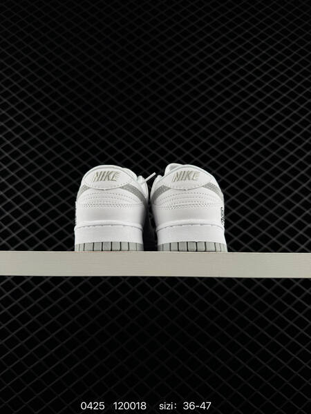 Nike SB Dunk Low Pro White with metallic silver accents 94 heel embroidery Supreme midsole marking EU 36-47 skate lifestyle