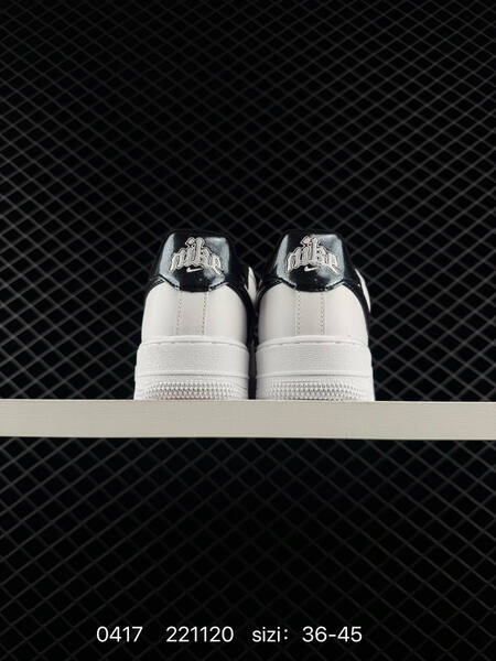 Nike Air Force 1 07 Low White with metallic black Swoosh black heel tab and lining EU 36-45 lifestyle