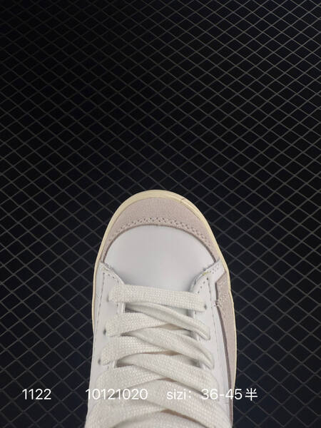 Nike WMNS Blazer Mid 77 Vintage SE white black cream with orange accents 36-45 lifestyle